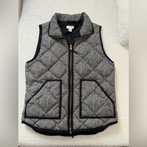 J. Crew puffer vest.  Size small.  Black and white with gold zipper.